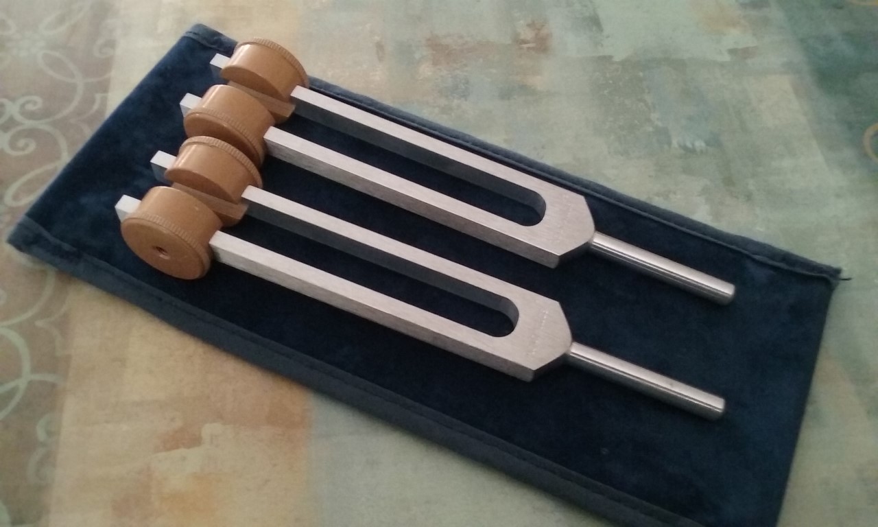 Acutonics tuning forks on a velvet case